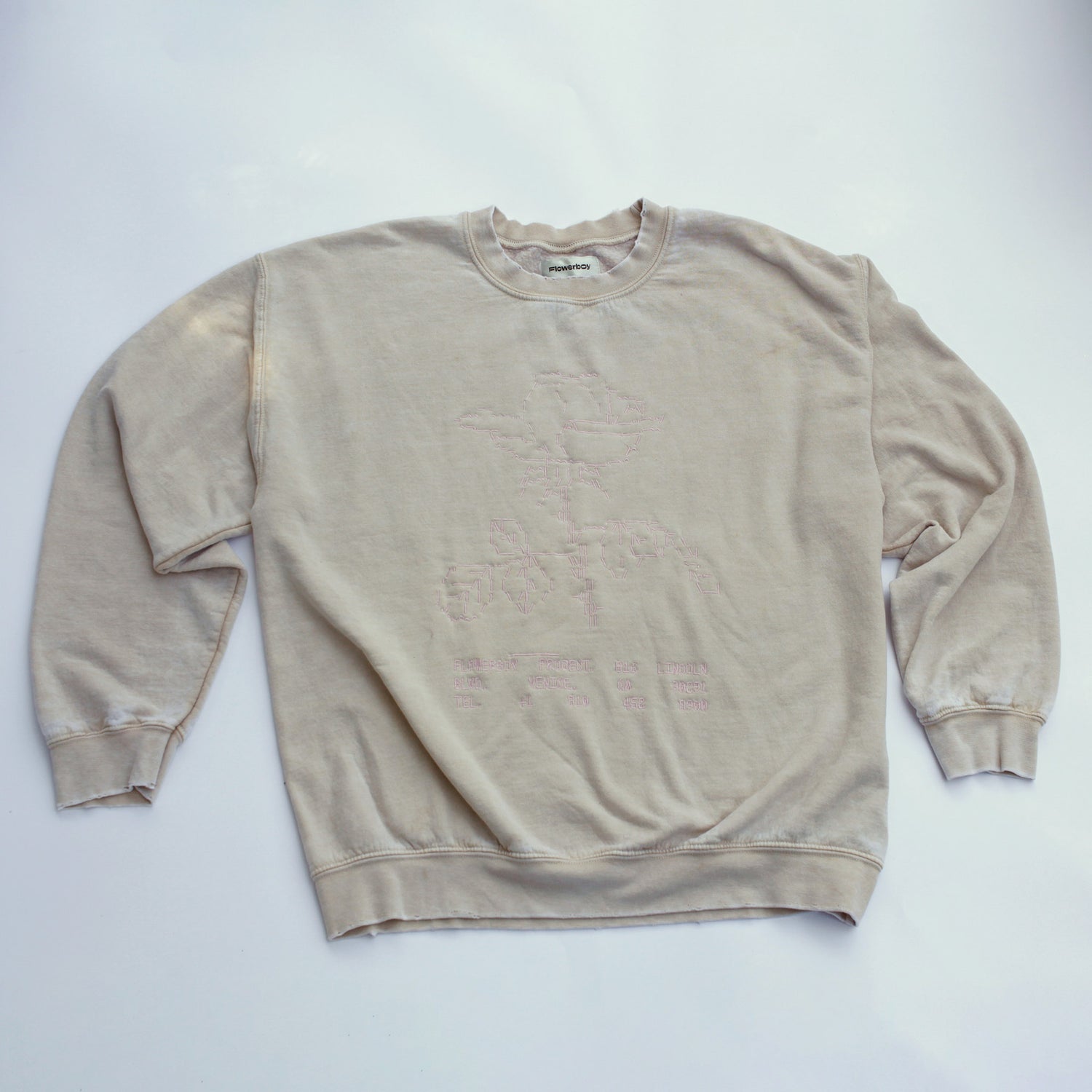 This cream Flowerboy crewneck has a washed effect and a great pink embroidery of a digitalized roze with our Venice shop address on Lincoln Boulevard.